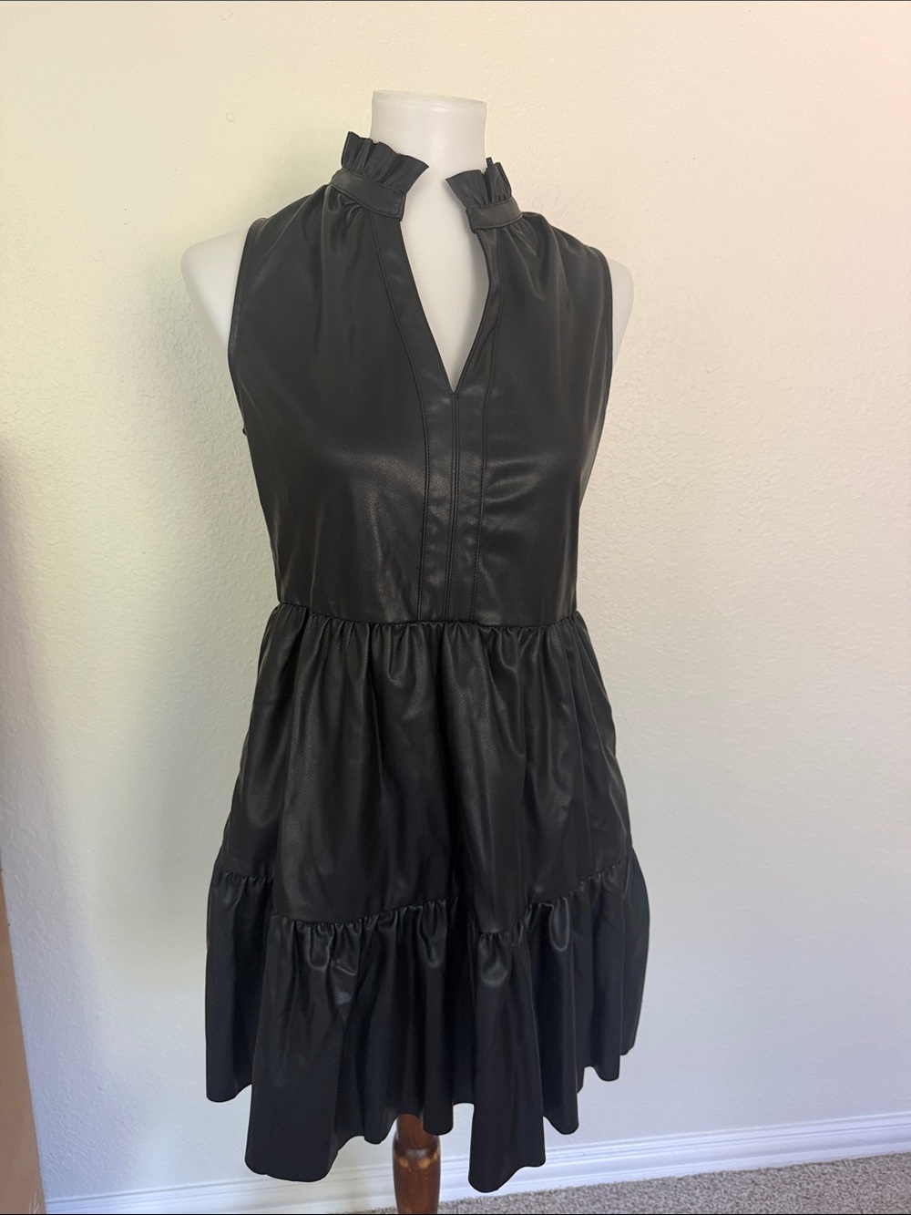 Sleeveless Black Faux Leather Ruffle-Neck Dress